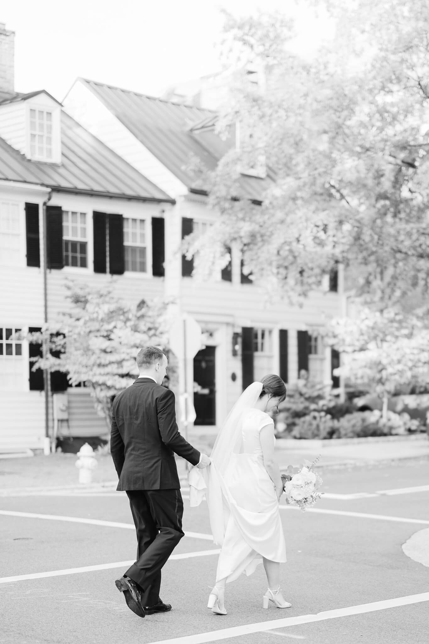bride and groom walking the streets of Alexandria VA