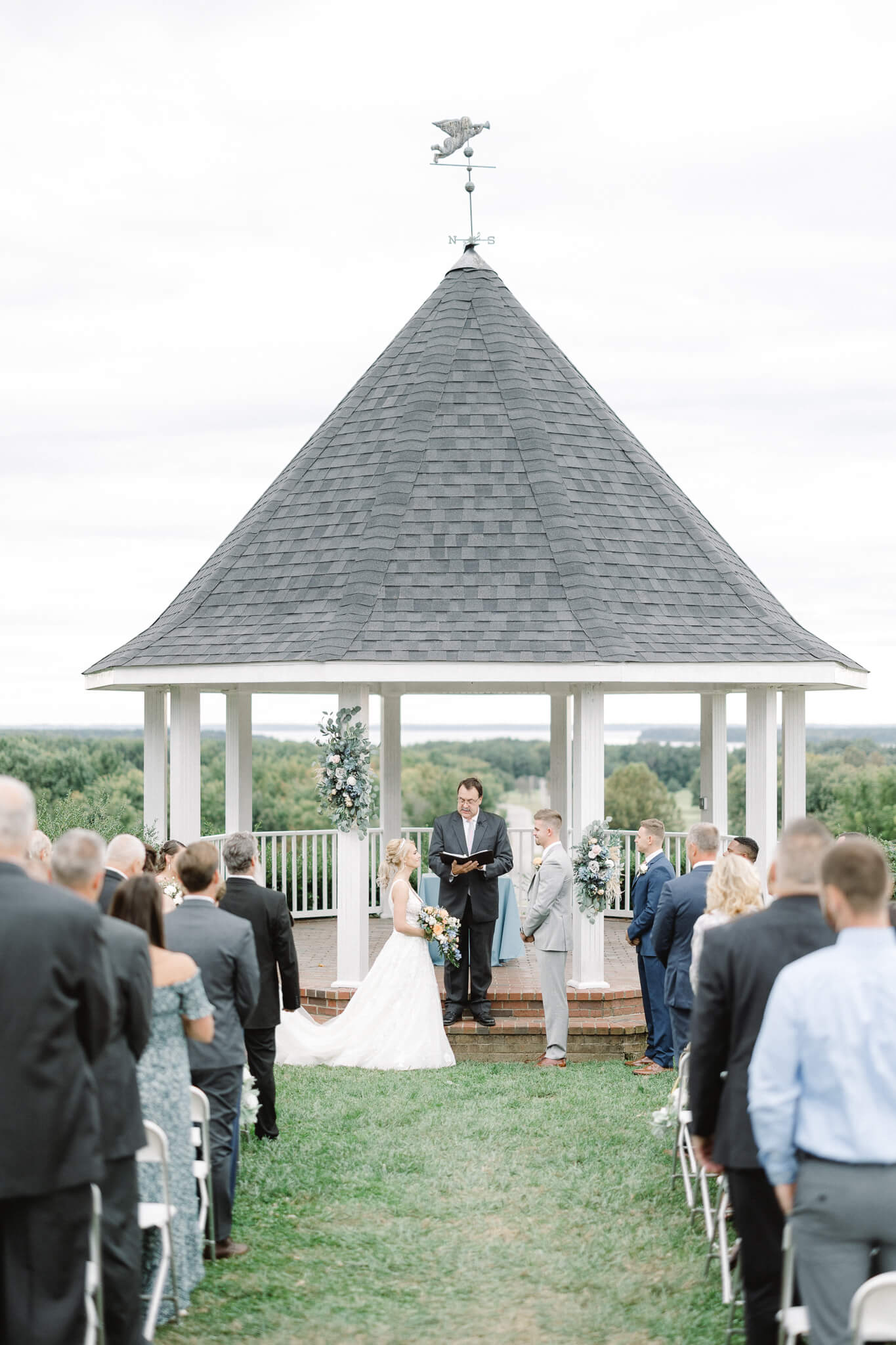 bride and groom sharing vows during their ceremony