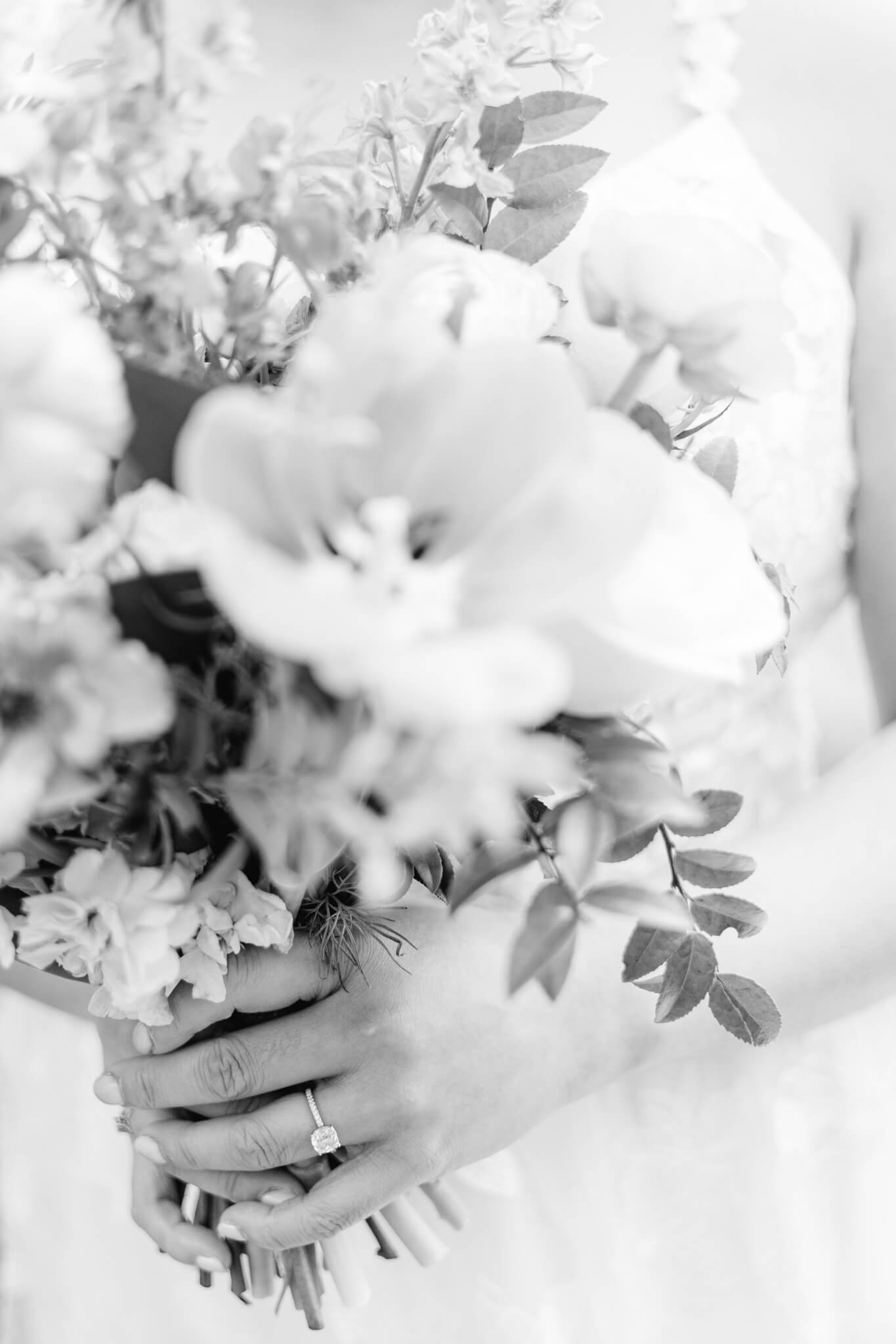 a bride holding her wedding bouquet