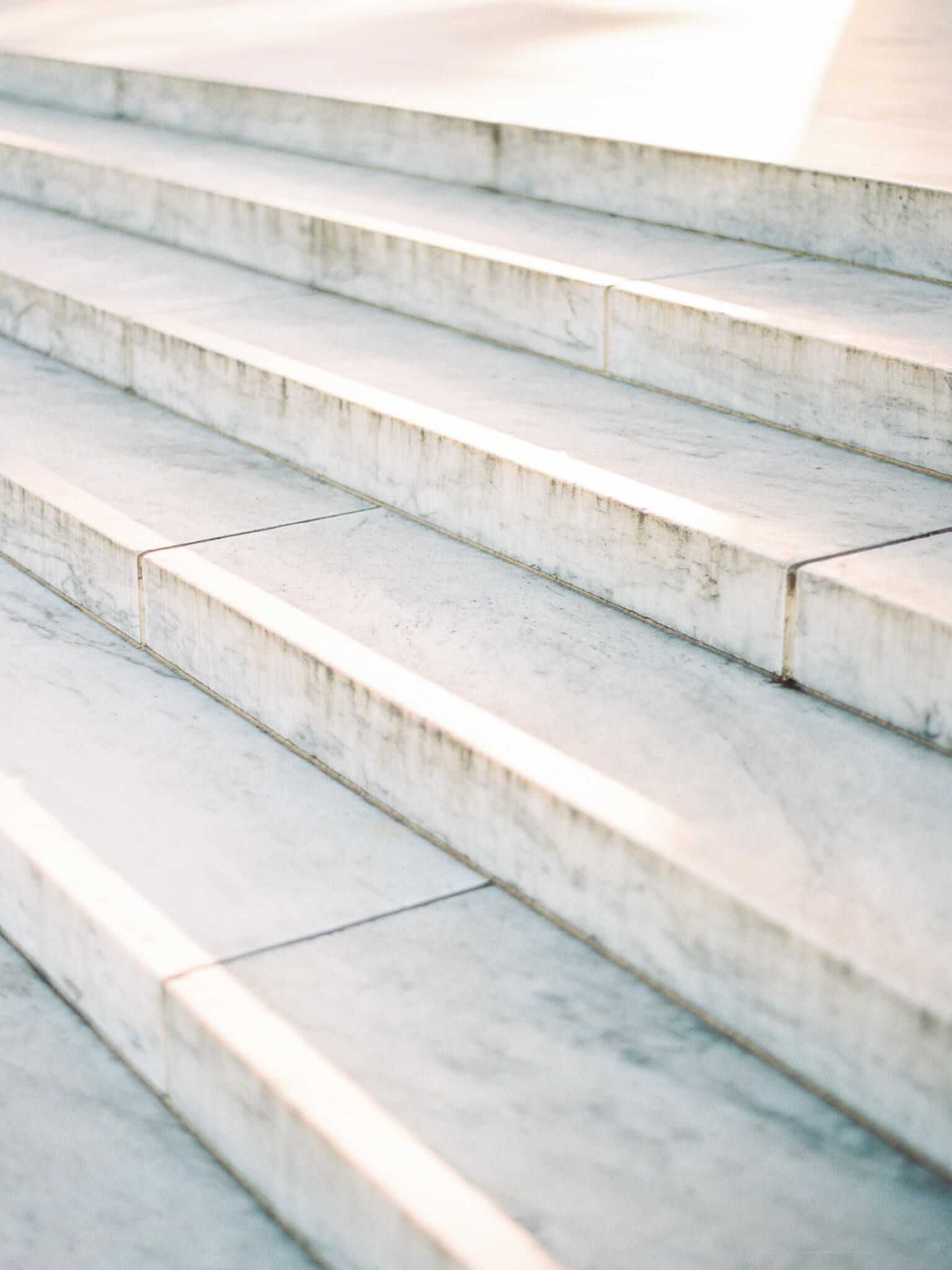 The marble steps of the Jefferson Memorial glowing in early morning light
