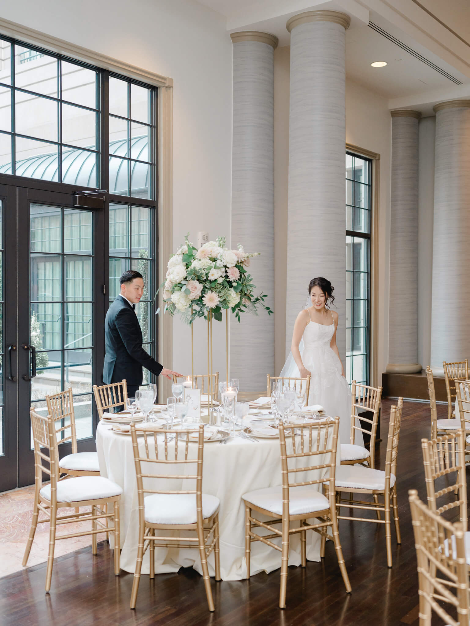 A bride and groom seeing their reception space for the first time at their Westin Georgetown Wedding.