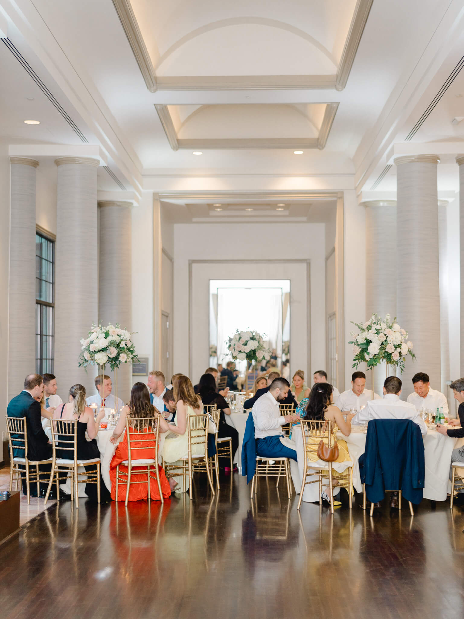 Guests eating at a wedding reception at a Westin Georgetown Wedding.