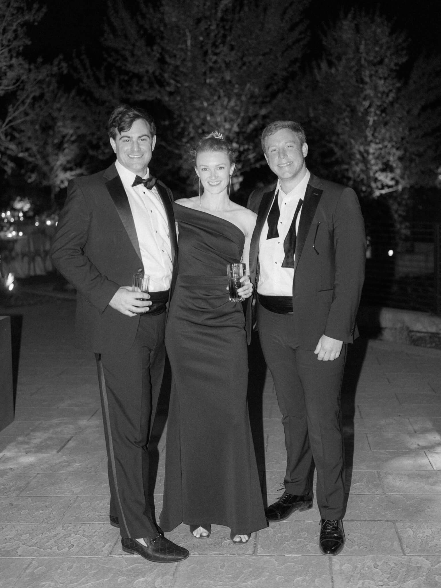 Black and white image of wedding guests.